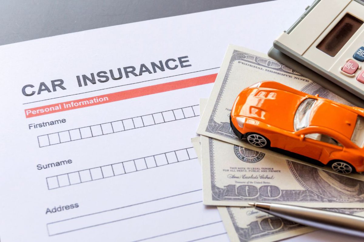 Car Insurance Form With Money, Car, And Calculator